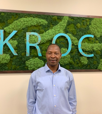 Headshot of Mathieu Bere in front of Kroc Image